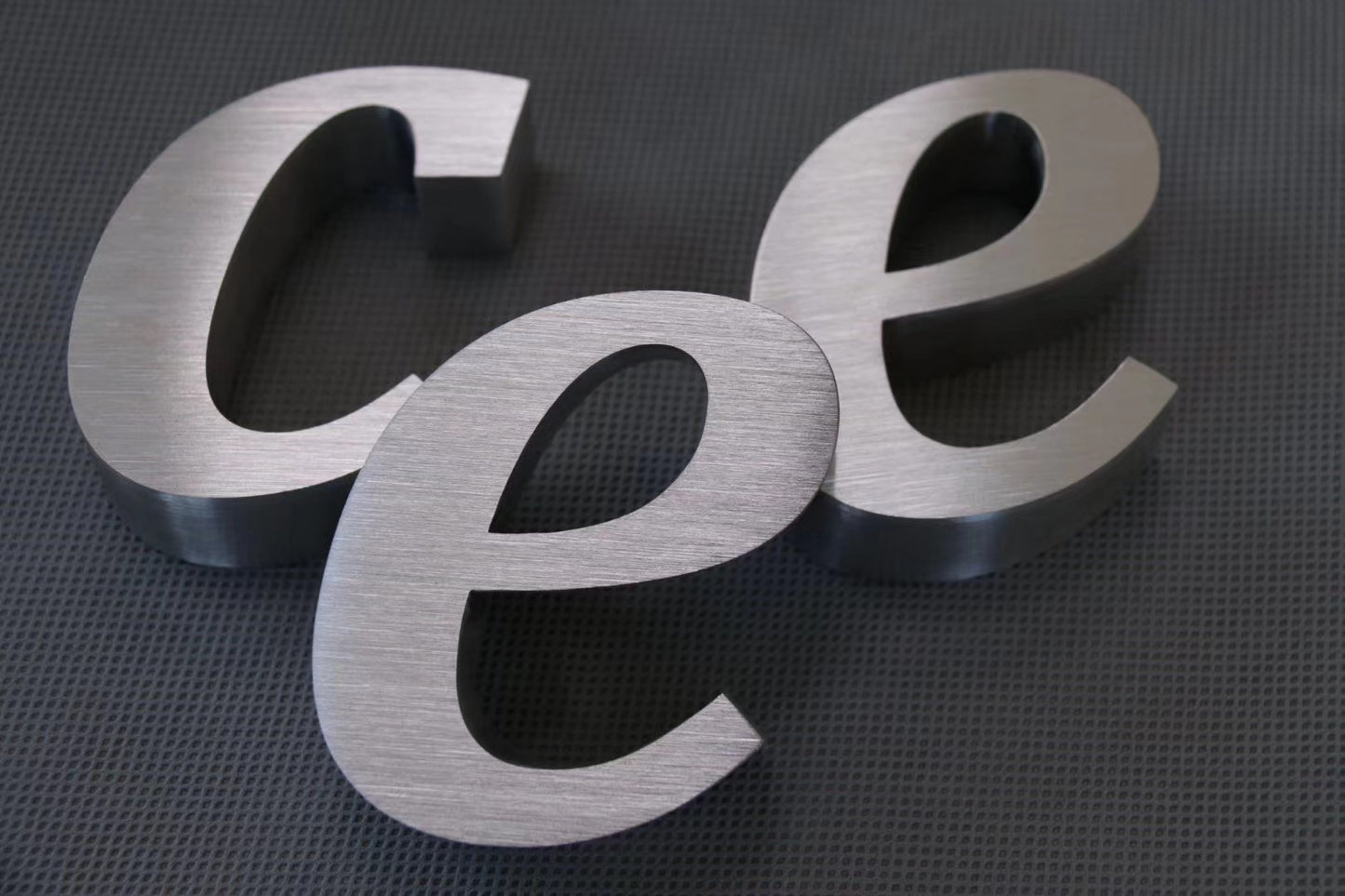 Customized metal logo letters on the wall